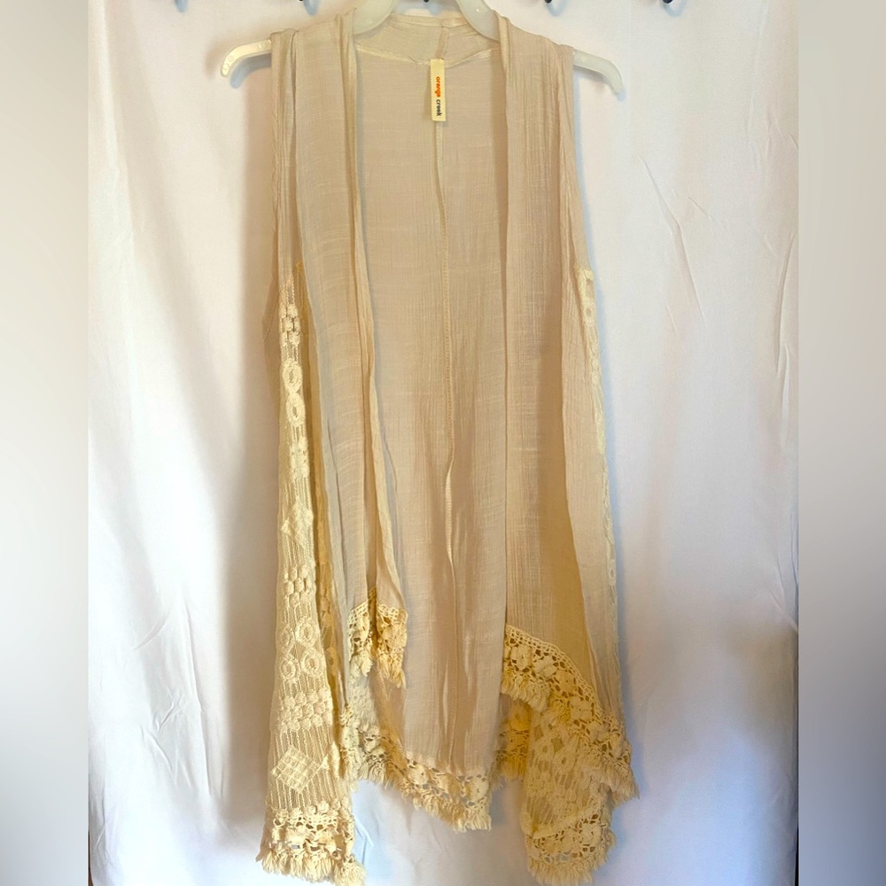 See through beige vest